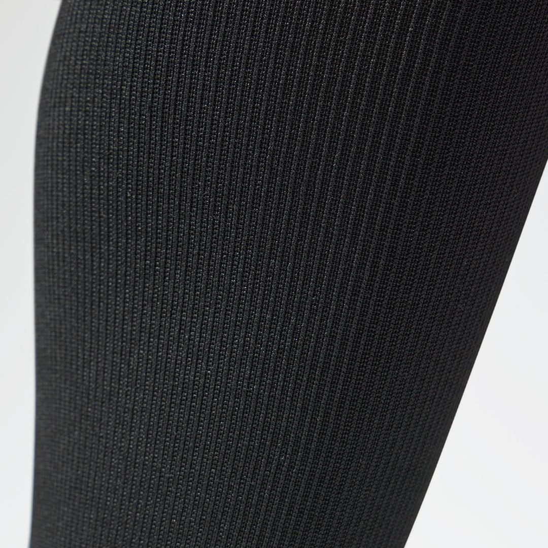 Detailed view of black unisex compression socks.