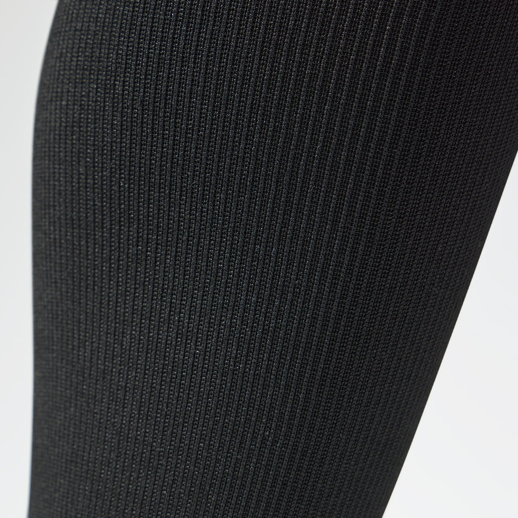 Detailed view of black unisex compression socks.